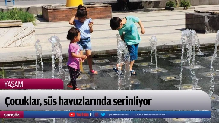 Çocuklar, süs havuzlarında serinliyor