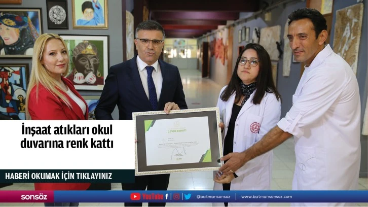 İnşaat atıkları okul duvarına renk kattı