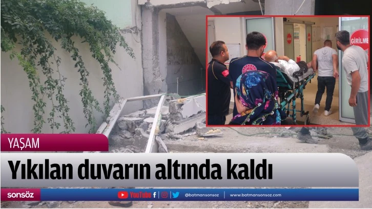 Yıkılan duvarın altında kaldı