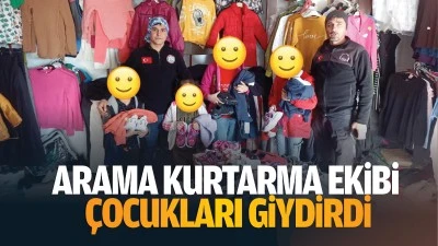 Arama Kurtarma Ekibi, çocukları giydirdi