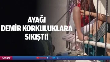 Ayağı demir korkuluklara sıkıştı!