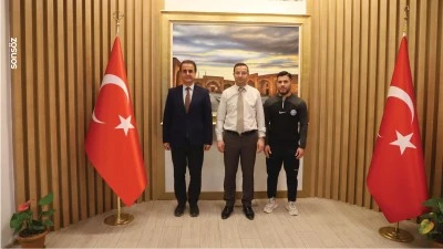 Milli güreşçi Sinan Sadak, Kaymakam Baycar'ı ziyaret etti